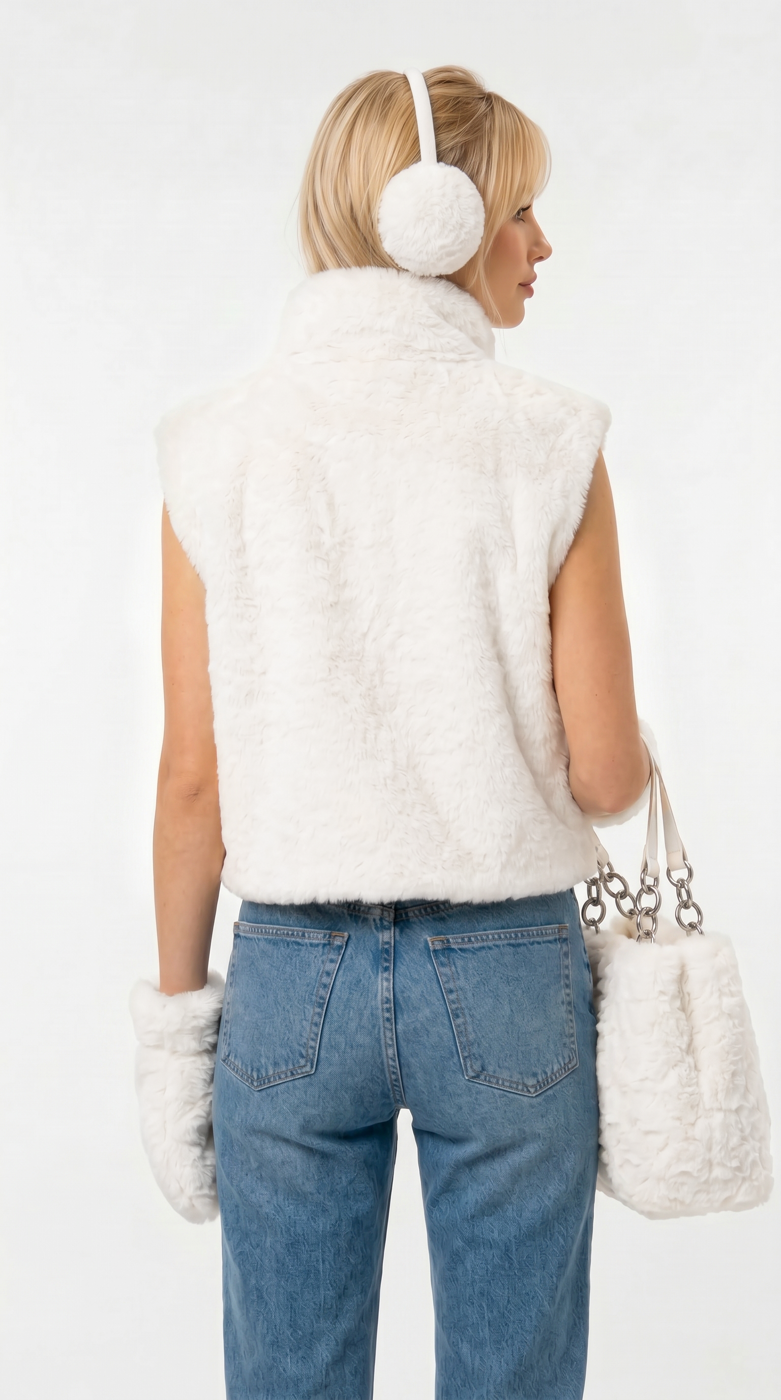 Person wearing a white sleeveless jacket, blue jeans, and white ear muffs on a white background from Meleche Fashion USA or Meléche (short as (Mé))