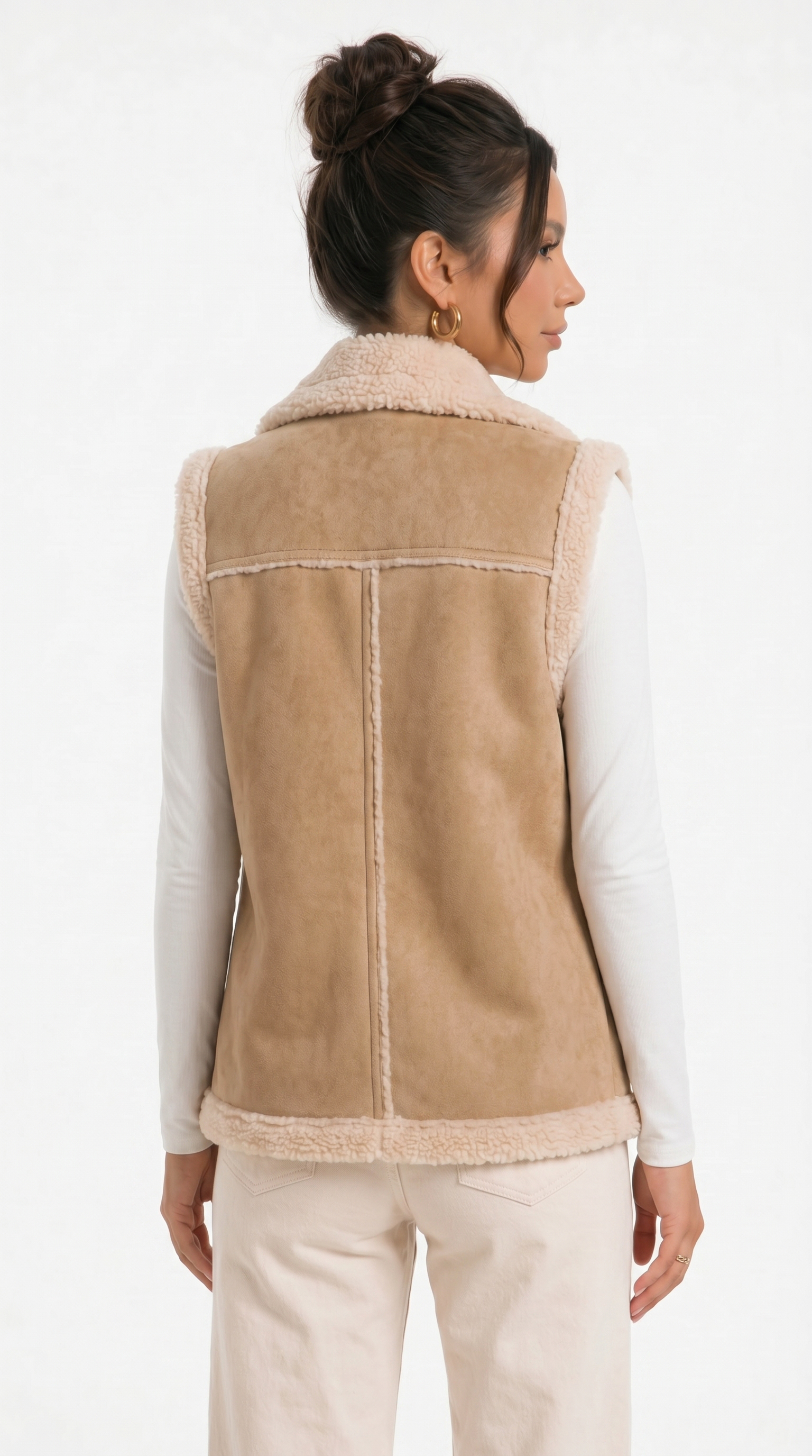 Woman wearing a beige shearling vest on a white background from Meleche Fashion USA or Meléche (short as (Mé))