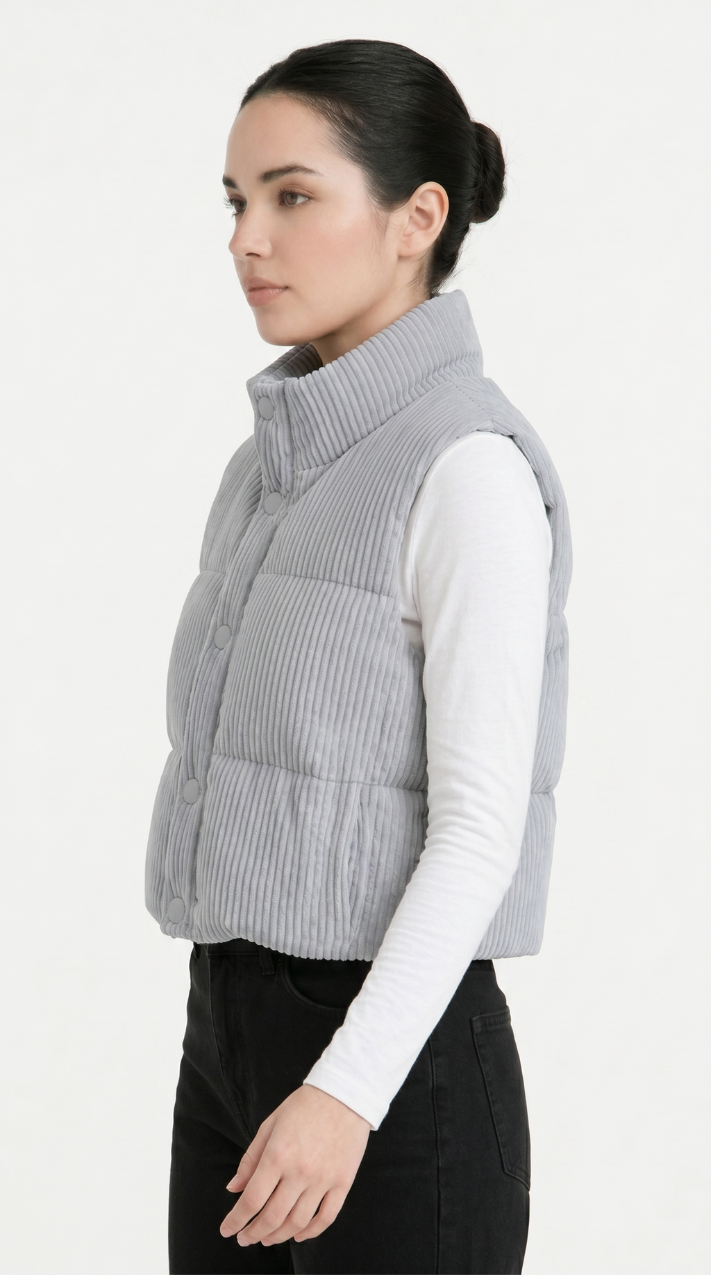 Woman wearing a gray knitted vest on a white background from Meleche Fashion USA or Meléche (short as (Mé))