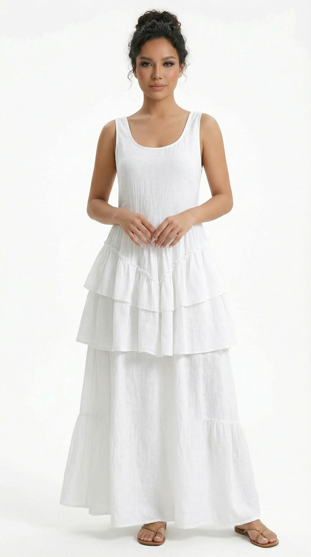 Woman wearing a green dress with ruffled details on a white background