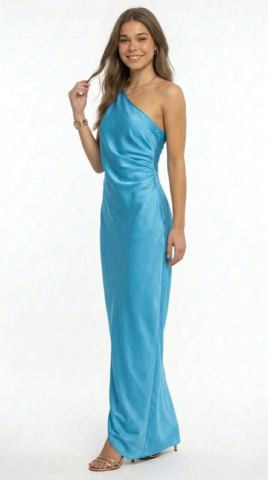 Woman wearing a blue one-shoulder gown on a white background