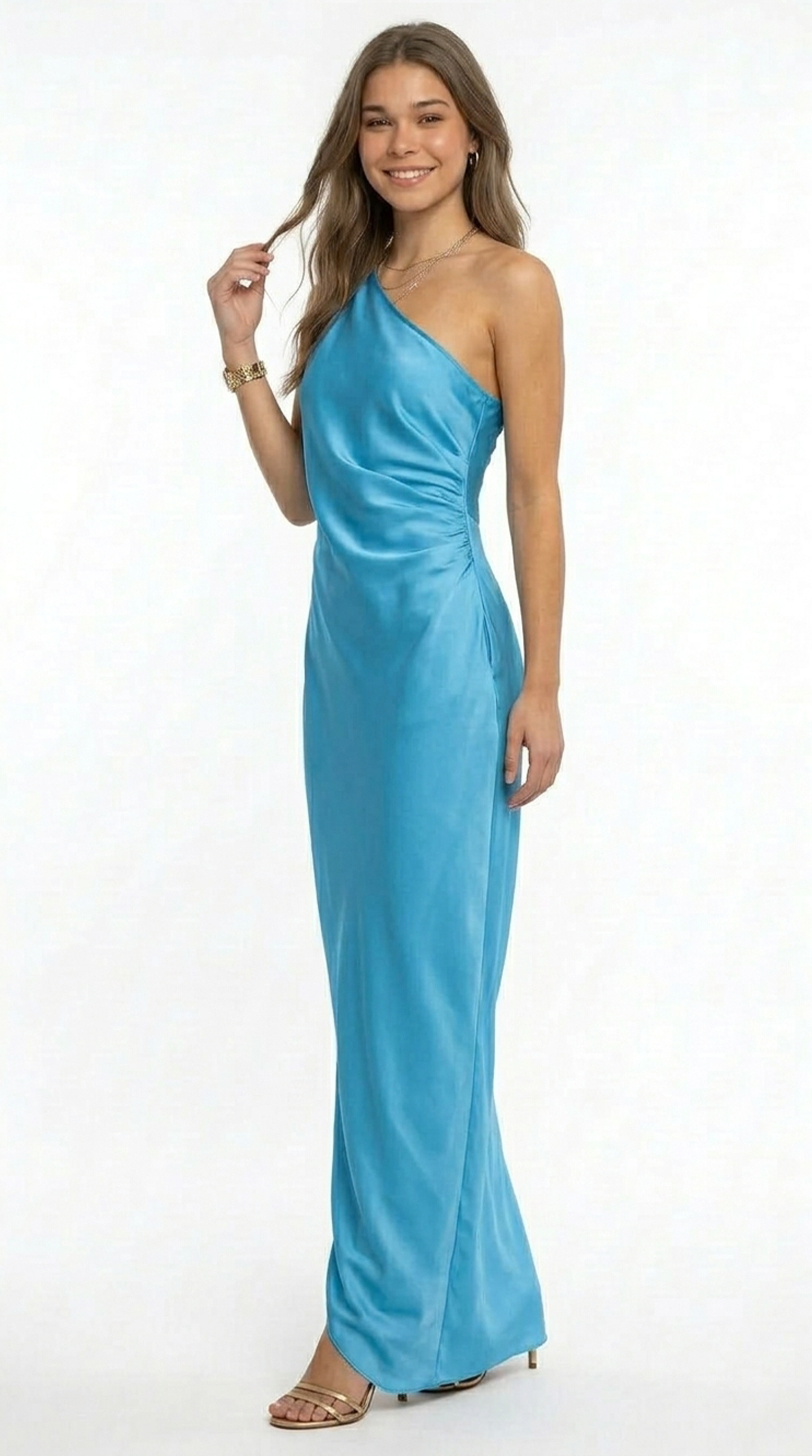 Woman wearing a blue one-shoulder gown on a white background
