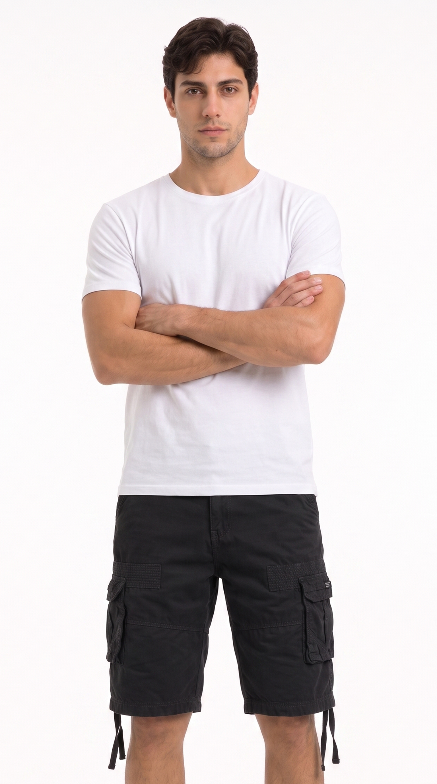 A man modeling a white crew-neck t-shirt and black cargo shorts against a plain white background, from Meleche Fashion USA or Meléche (short as (Mé))