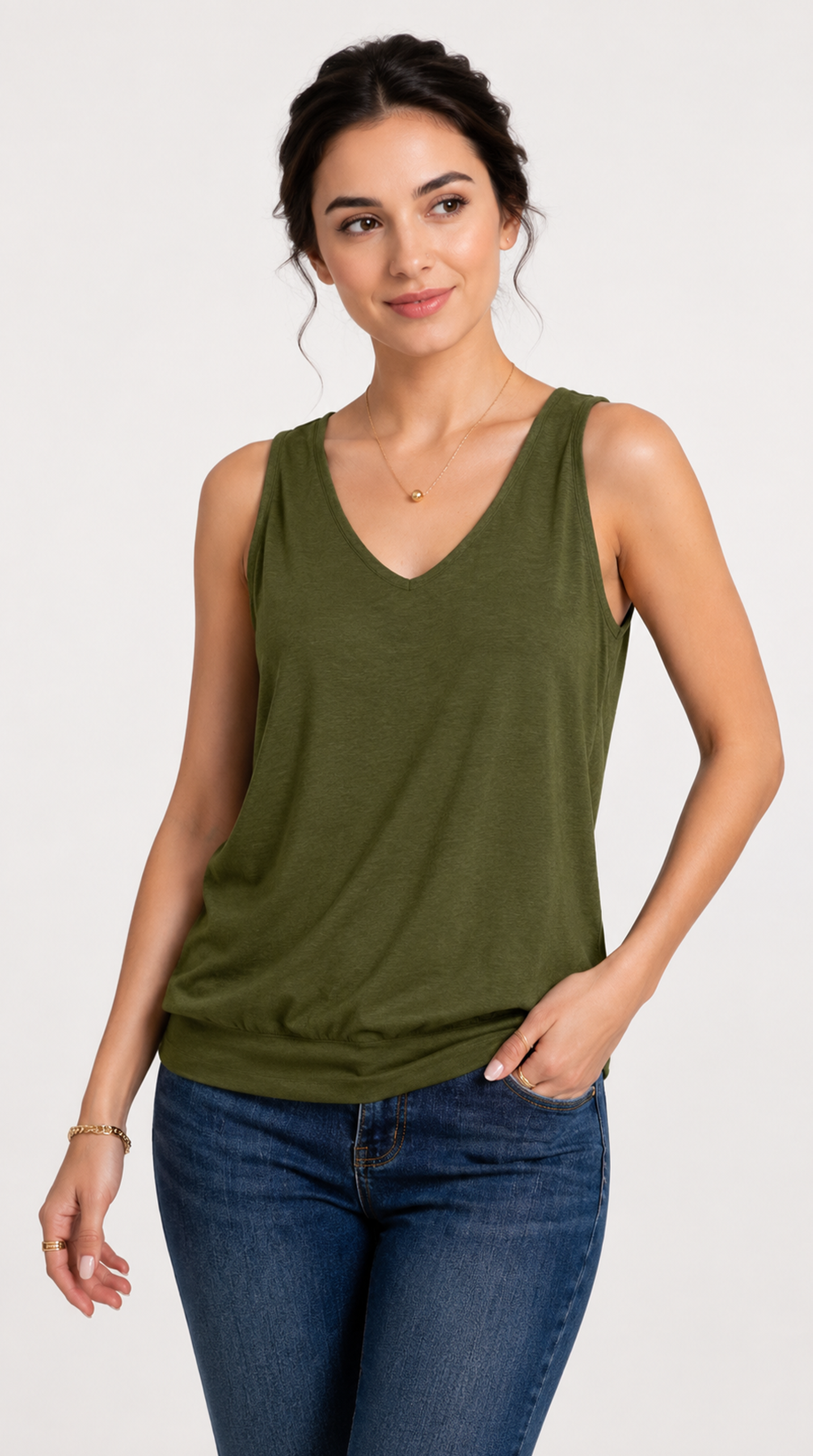 Woman wearing an olive green sleeveless top and blue jeans on a white background, from Meleche Fashion USA or Meléche (short as (Mé))