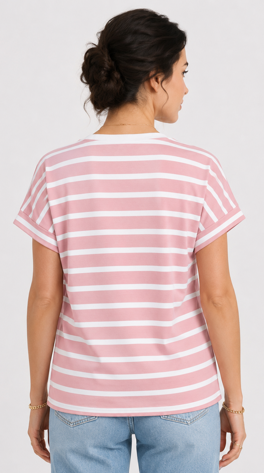 Woman wearing a pink and white striped t-shirt on a plain background, from Meleche Fashion USA or Meléche (short as (Mé))