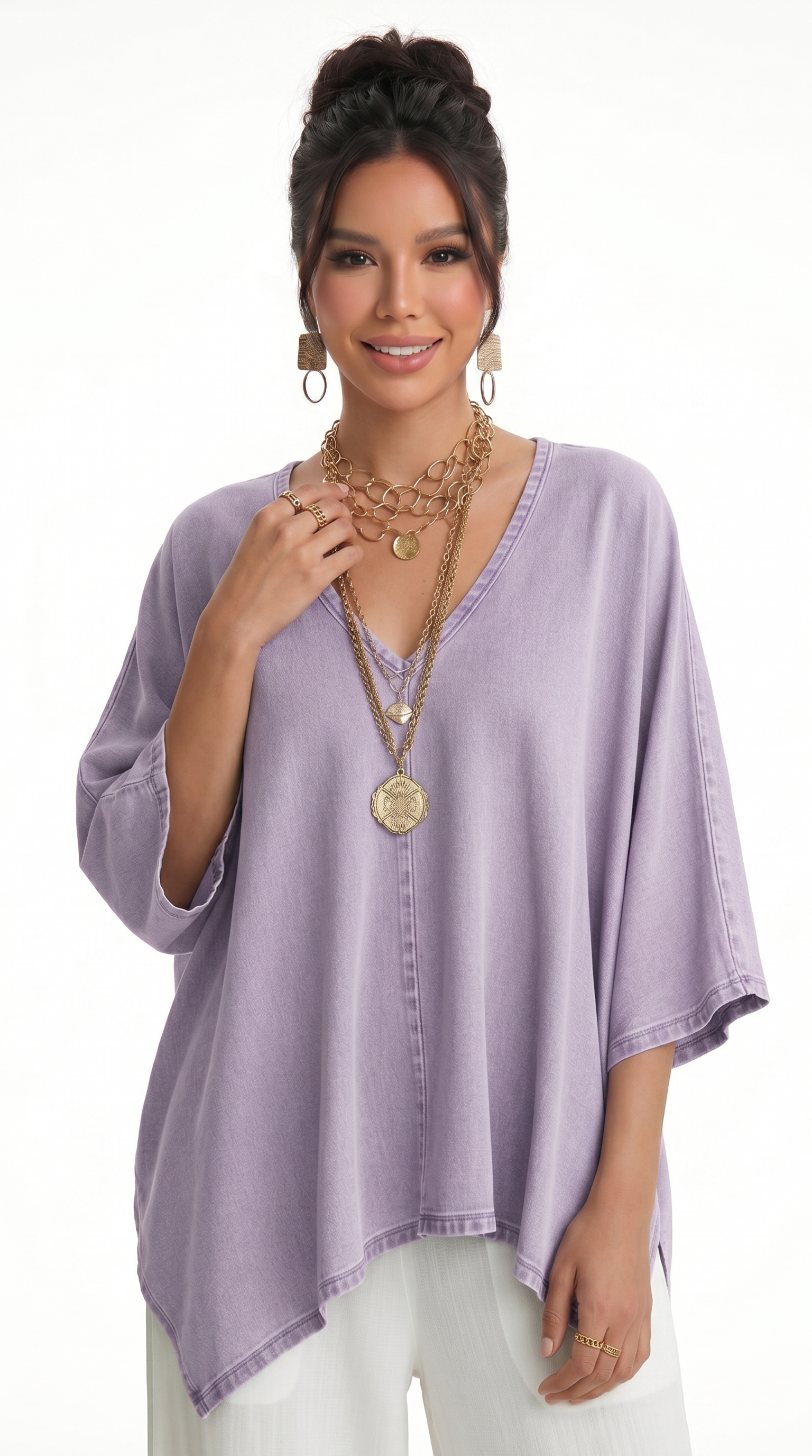 Woman wearing a light purple blouse with layered necklaces on a white background, from Meleche Fashion USA or Meléche (short as (Mé))