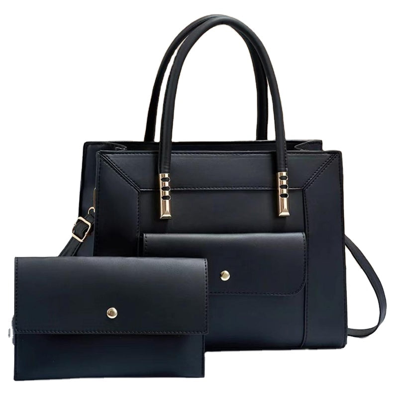 Jannik - Black handbag set with matching wallet on a white background from Meleche or Meléche (short as (Mé))