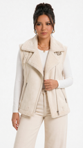 girl wearing a beige vest with a plain background from Meleche Fashion USA or Meléche (short as (Mé))