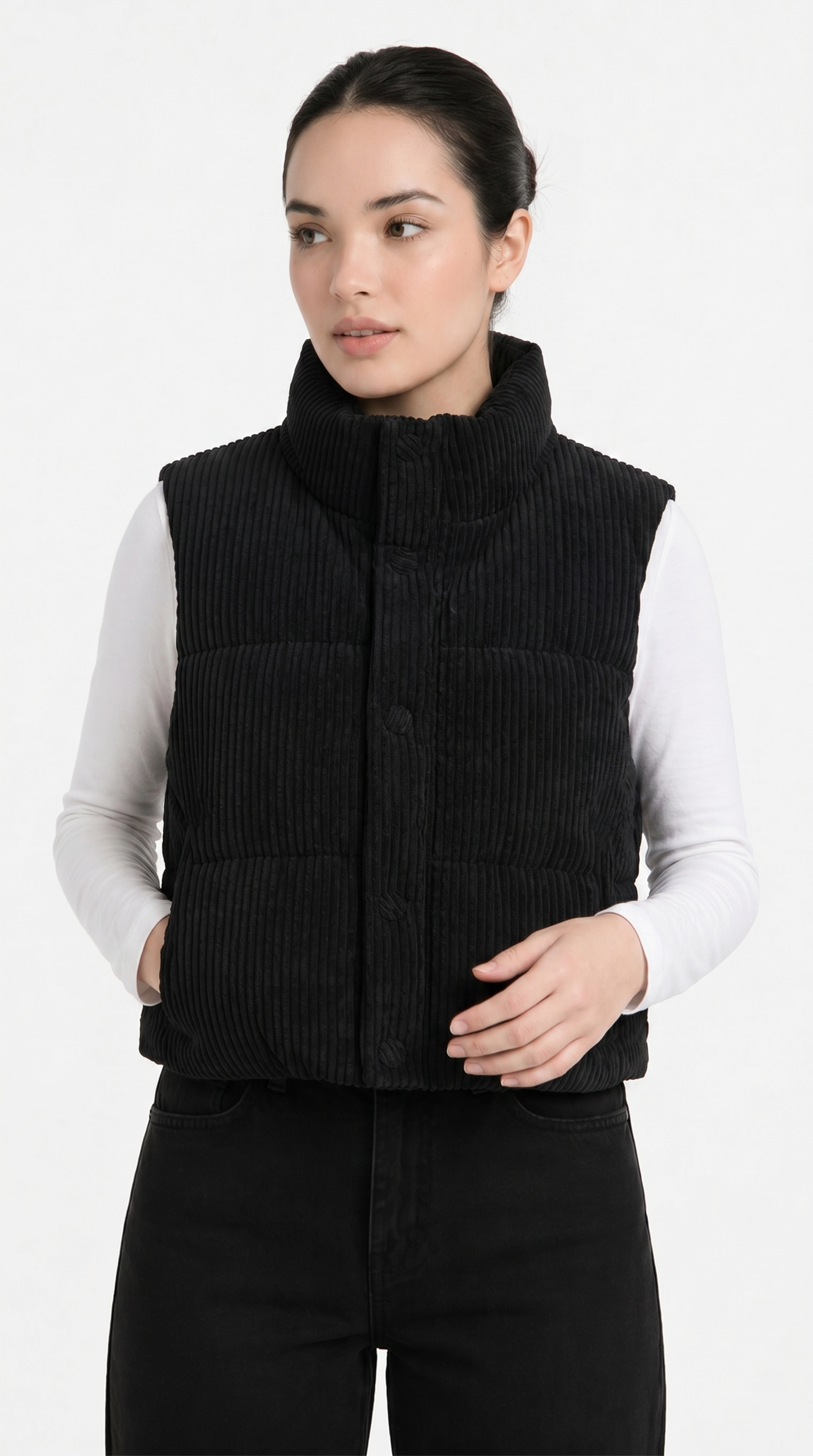 Woman wearing a black corduroy vest over a white shirt on a white background from Meleche Fashion USA or Meléche (short as (Mé))