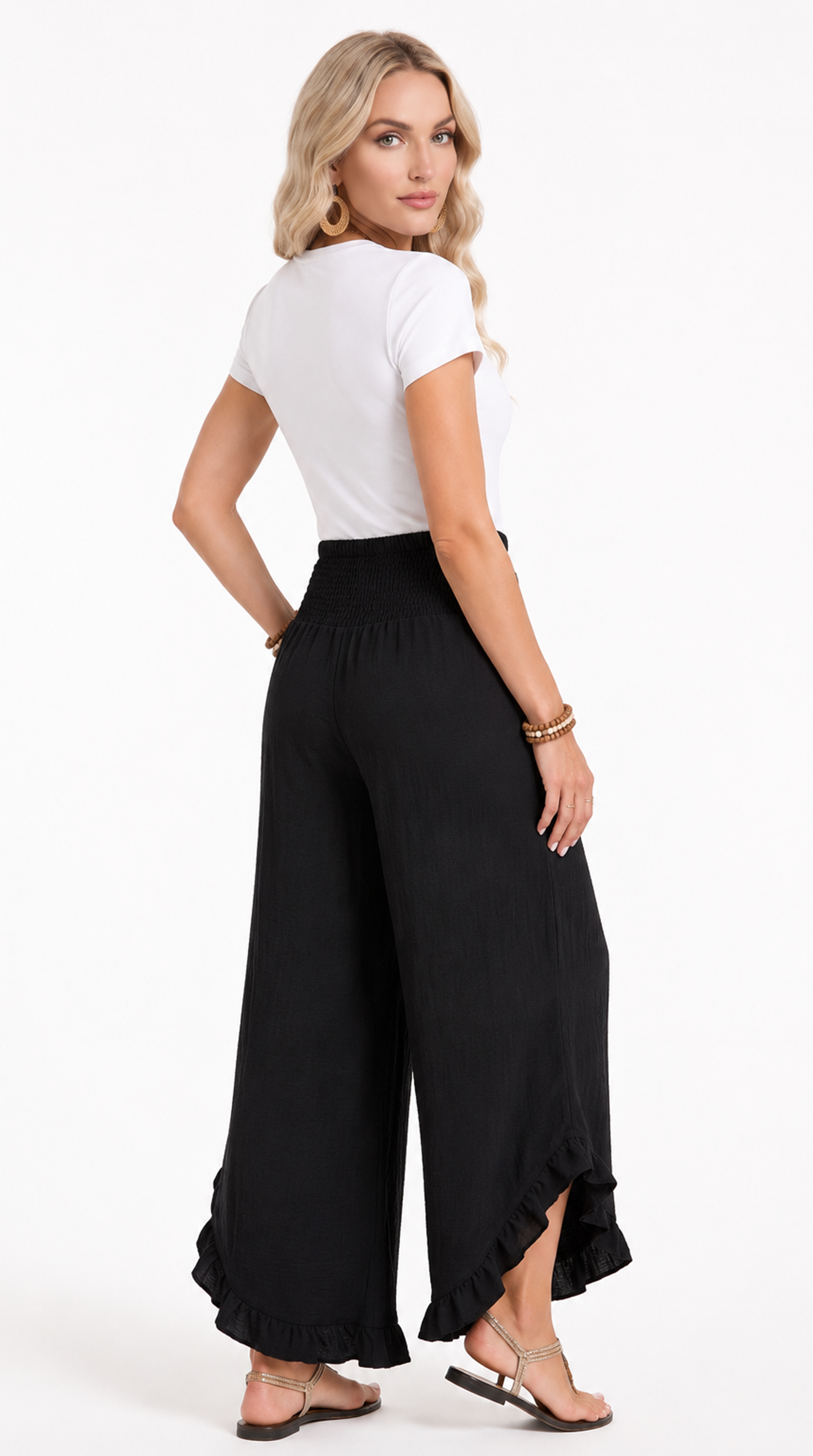 Woman wearing a white top and black wide-leg pants on a white background, from Meleche Fashion USA or Meléche (short as (Mé))