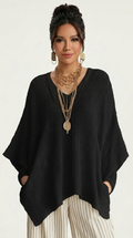Woman wearing a white top with lace trim on a plain background from Meleche or Meléche (short as (Mé))