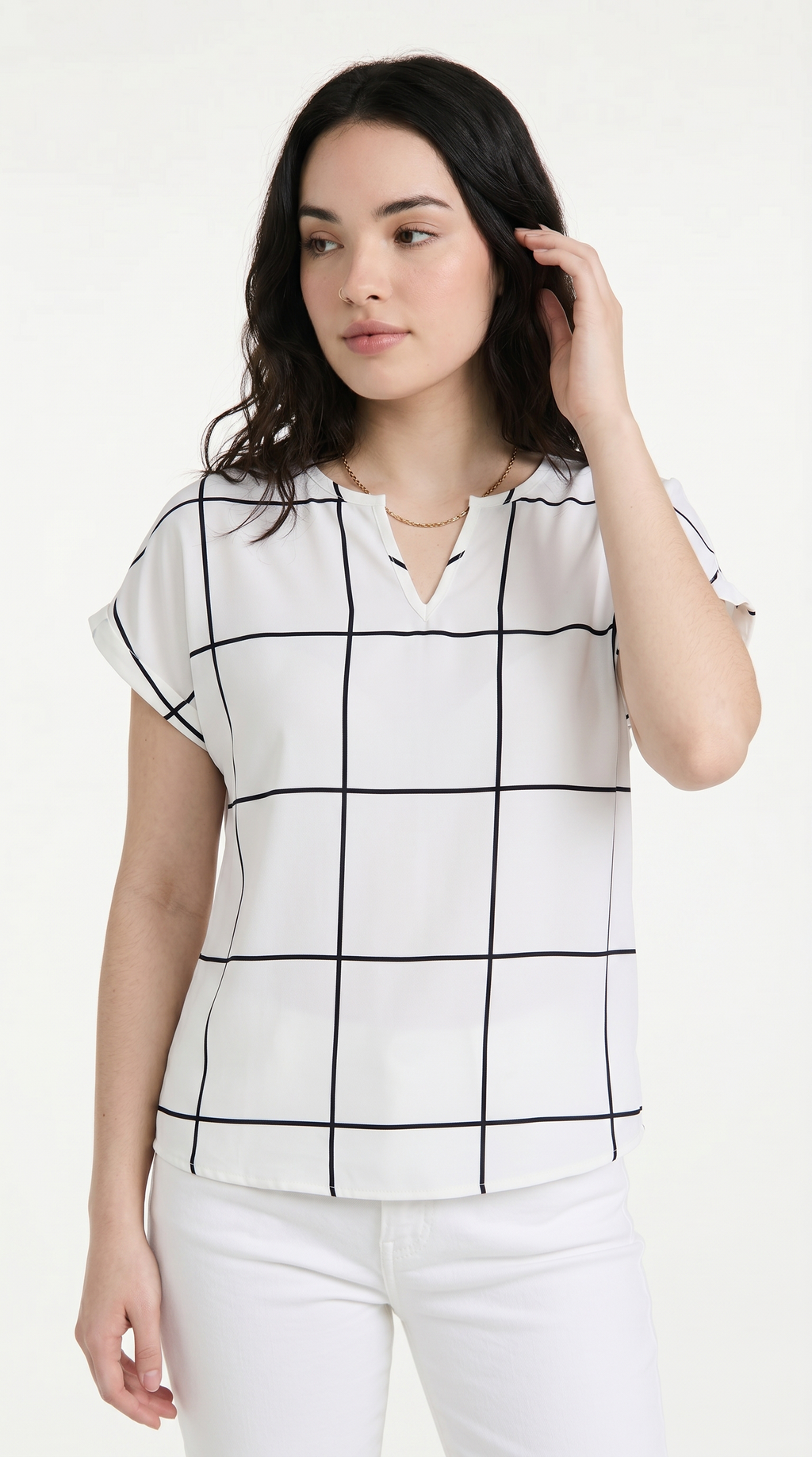 Woman wearing a white blouse with black grid pattern on a white background, from Meleche Fashion USA or Meléche (short as (Mé))