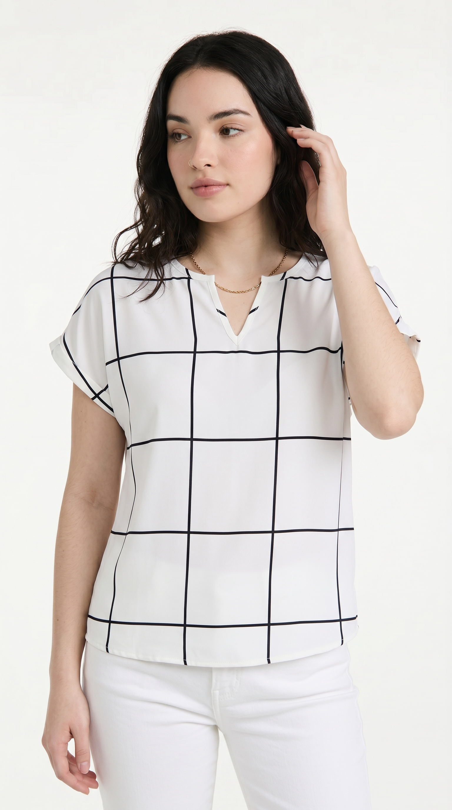Woman wearing a white blouse with black grid pattern on a white background, from Meleche Fashion USA or Meléche (short as (Mé))