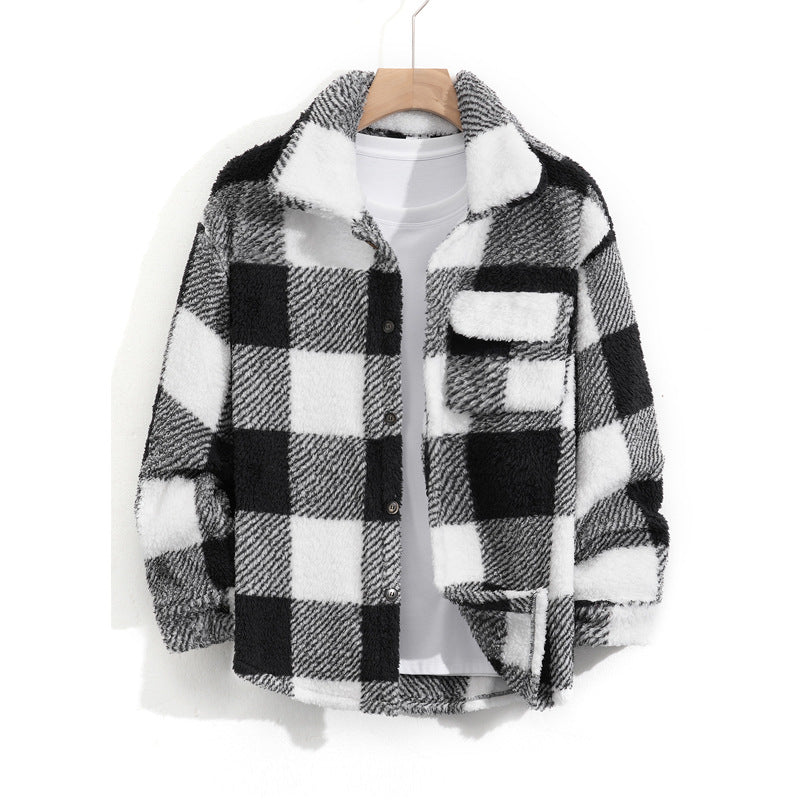Black and white checkered shirt on a hanger against a white background
