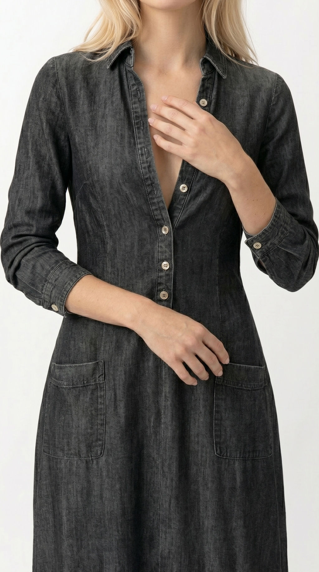 Woman wearing a black denim dress with a plain background, Loos dress from Meleche Fashion USA or Meléche (short as (Mé))