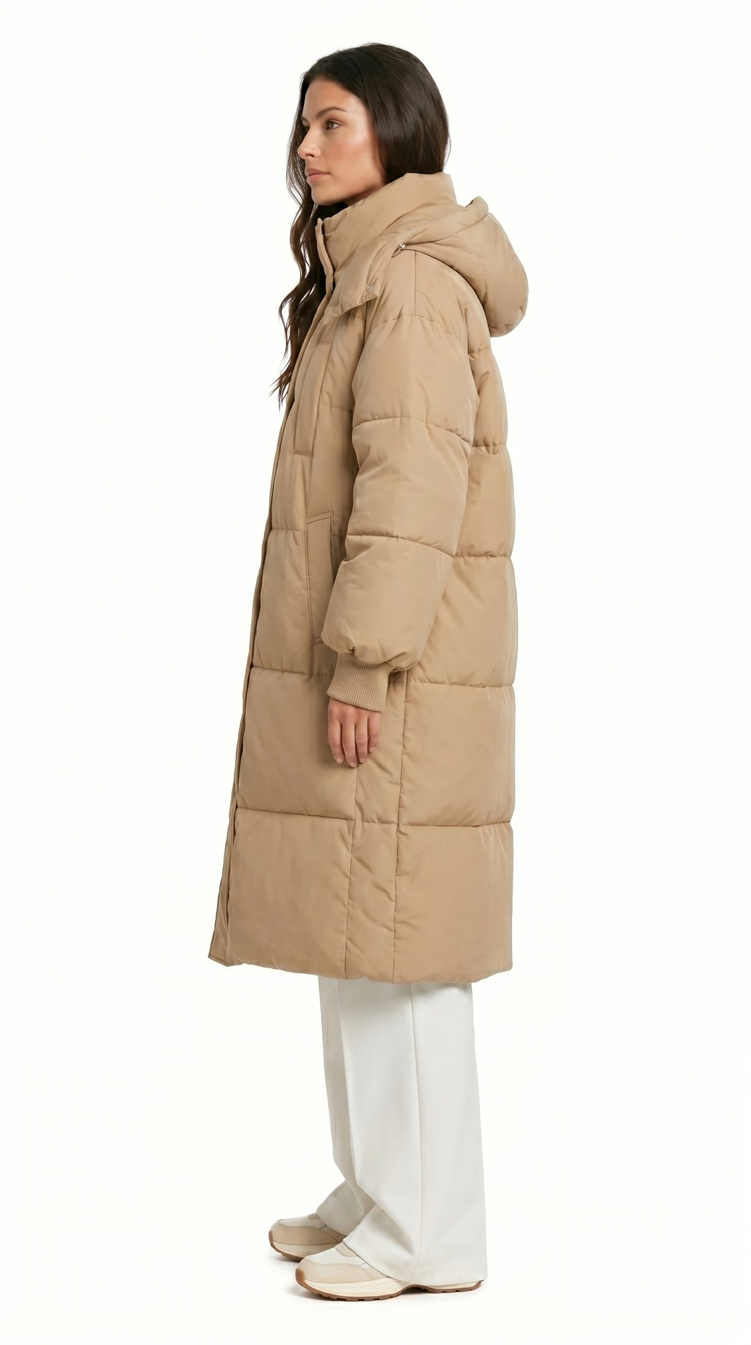 Woman wearing a beige puffer coat on a white background from Meleche Fashion USA or Meléche (short as (Mé))