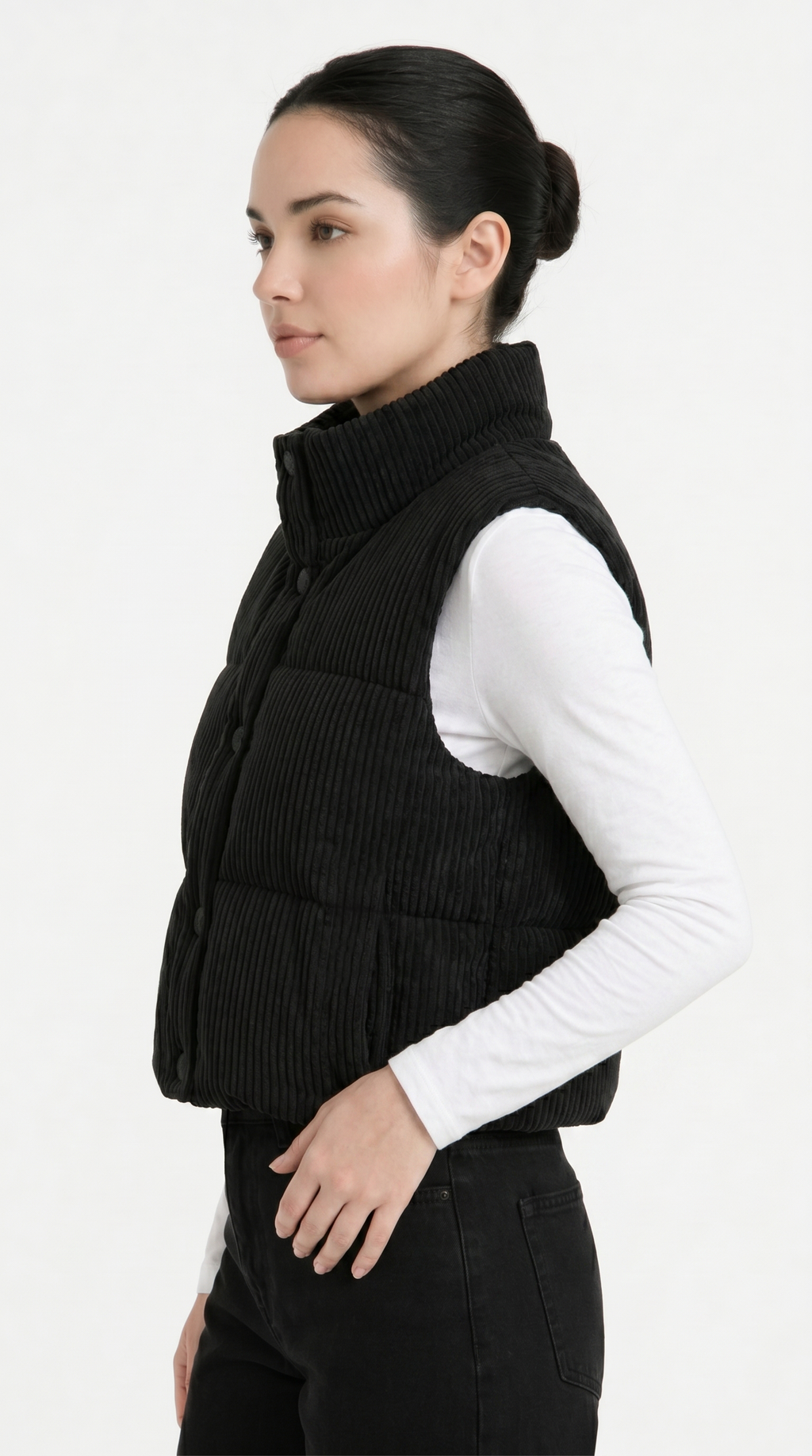 Woman wearing a black vest over a white shirt on a white background from Meleche Fashion USA or Meléche (short as (Mé))