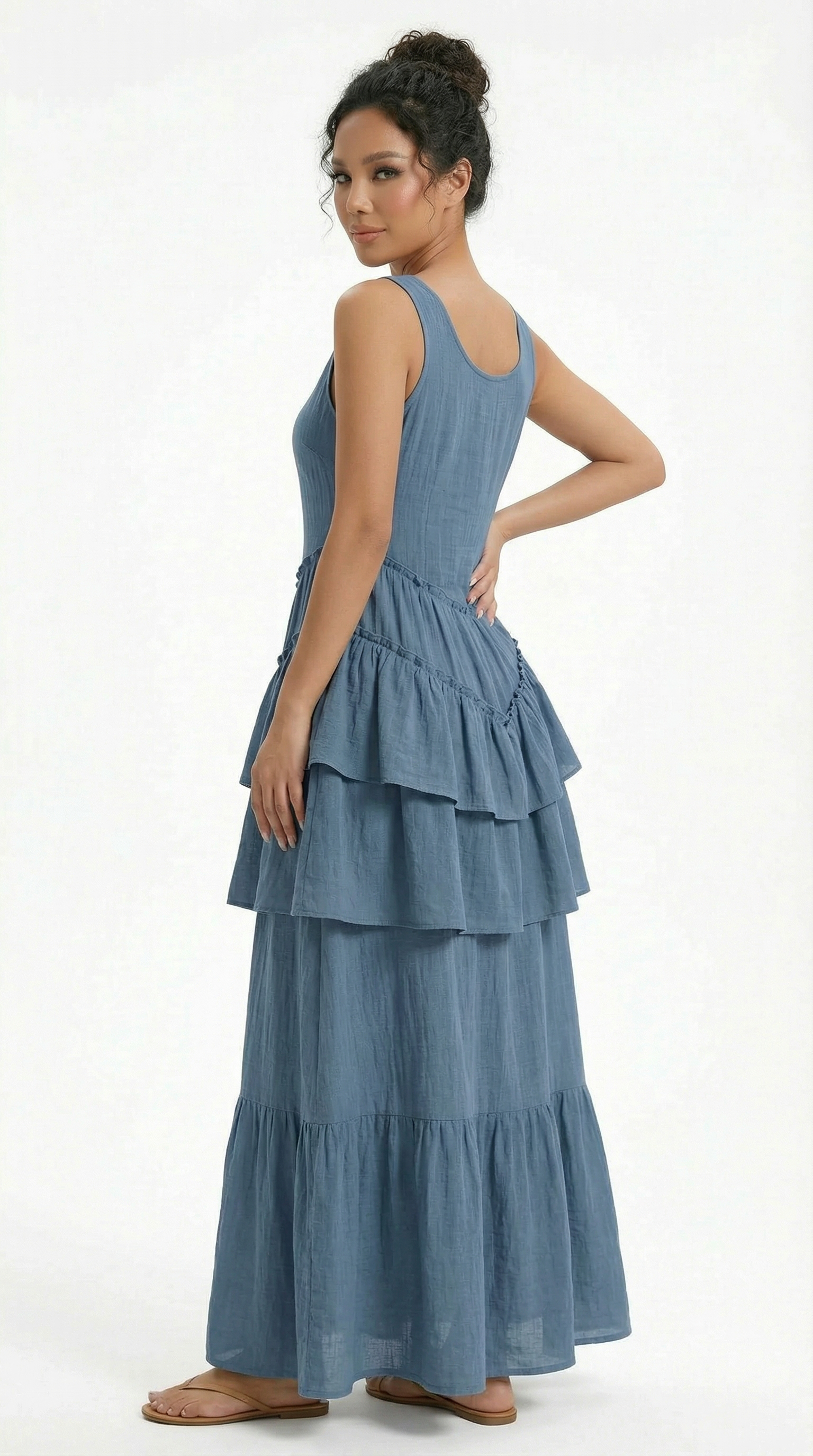 Person wearing a black sweater on a white background