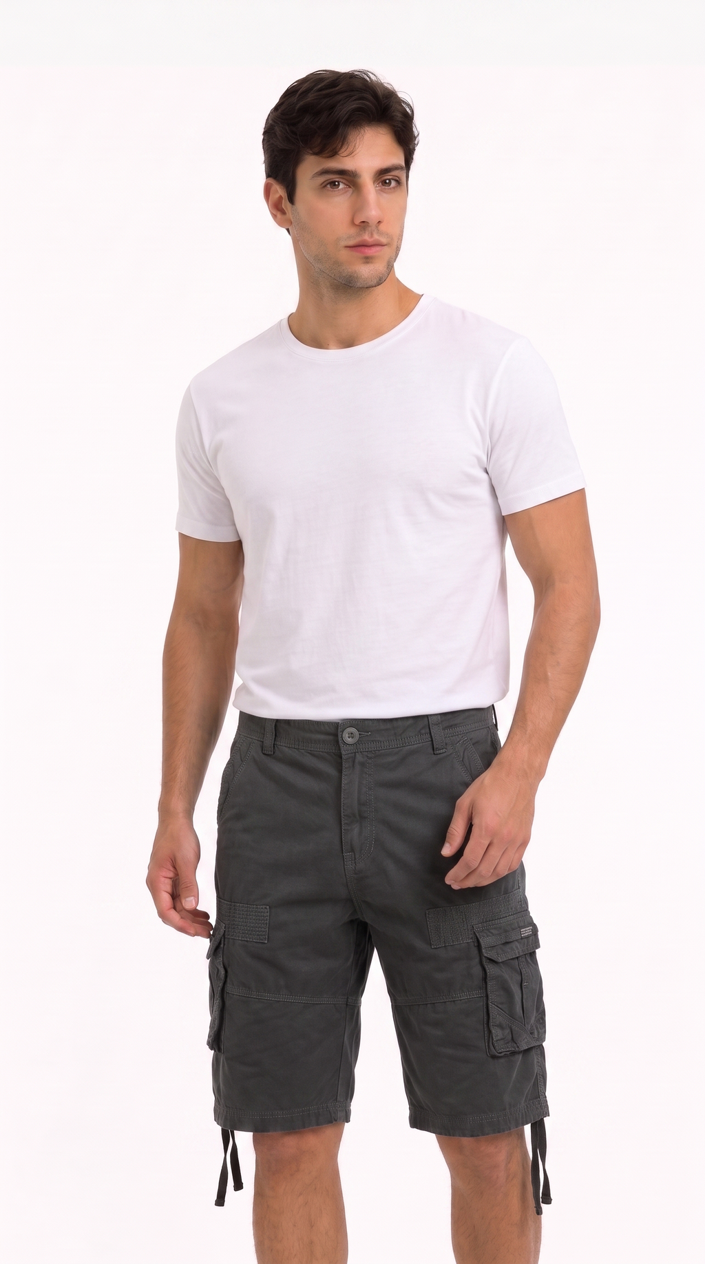 A man modeling a white crew-neck t-shirt and dark gray cargo shorts against a plain white background, from Meleche Fashion USA or Meléche (short as (Mé))