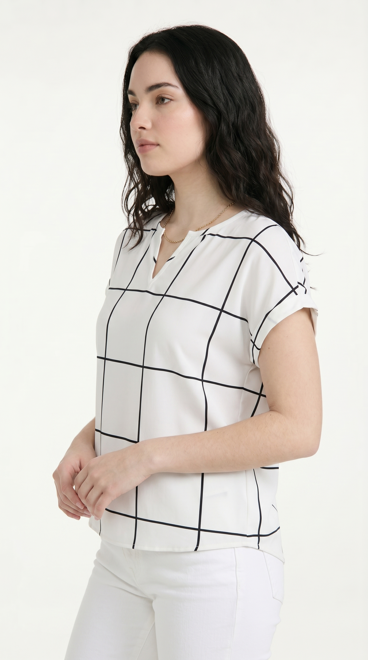 Woman wearing a white blouse with black grid pattern on a white background, from Meleche Fashion USA or Meléche (short as (Mé))