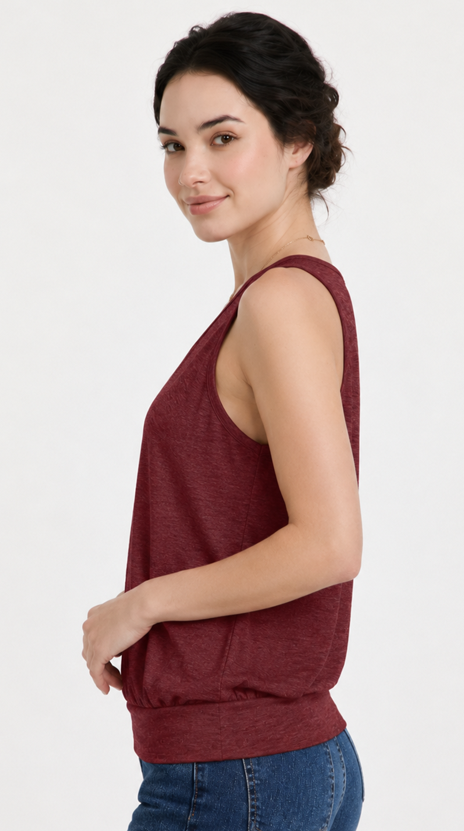 Woman wearing a maroon sleeveless top on a white background, from Meleche Fashion USA or Meléche (short as (Mé))