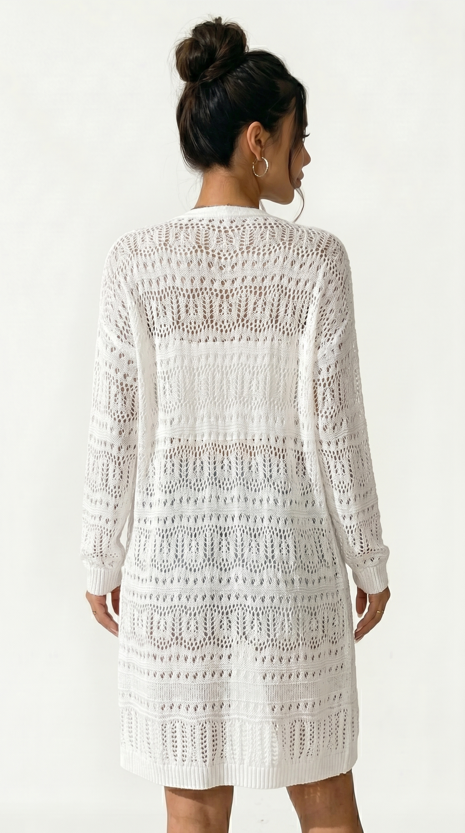 Woman wearing a white crochet dress against a white background from Meleche or Meléche (short as (Mé))