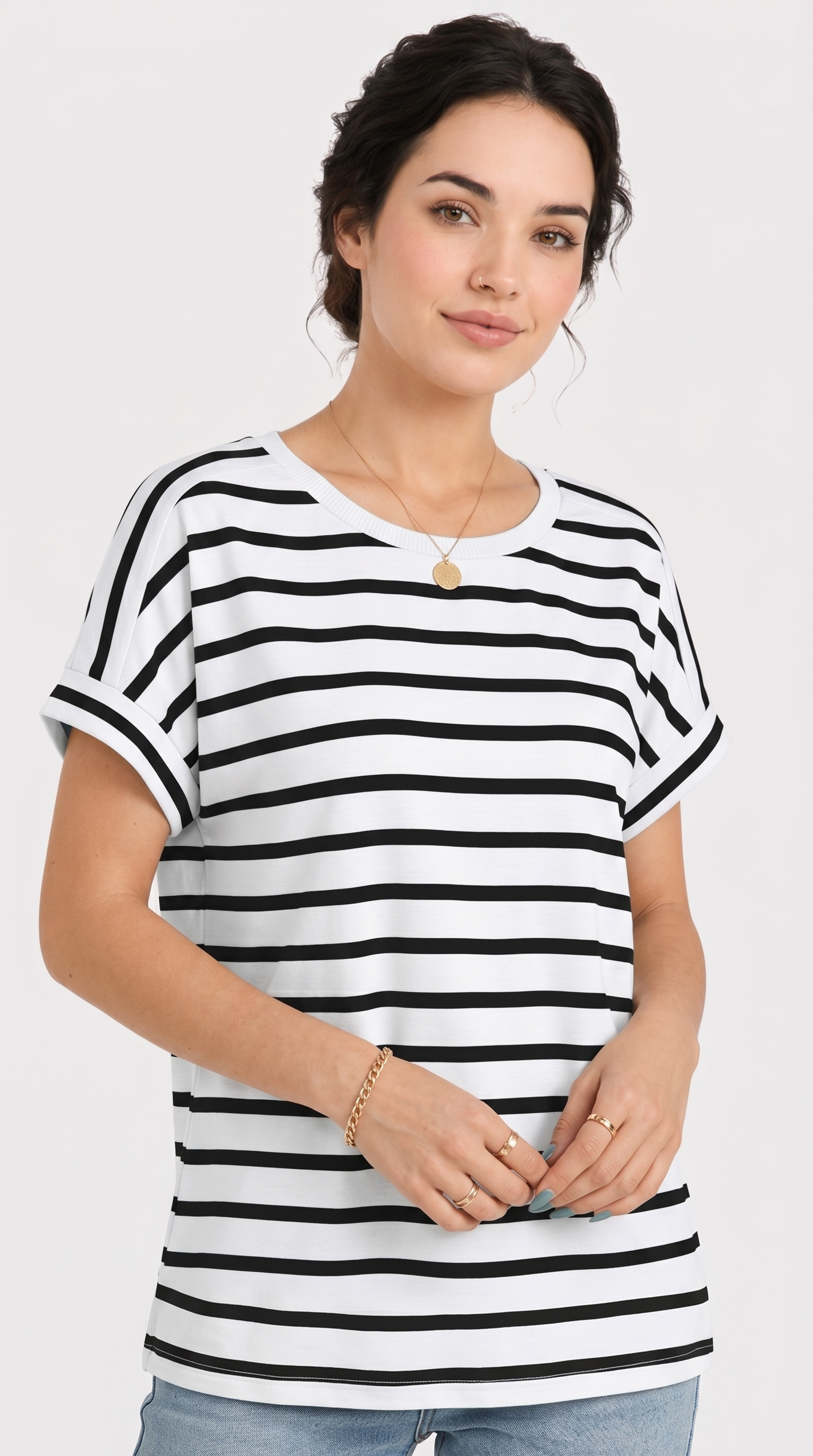 Woman wearing a black and white striped t-shirt on a plain background, from Meleche Fashion USA or Meléche (short as (Mé))