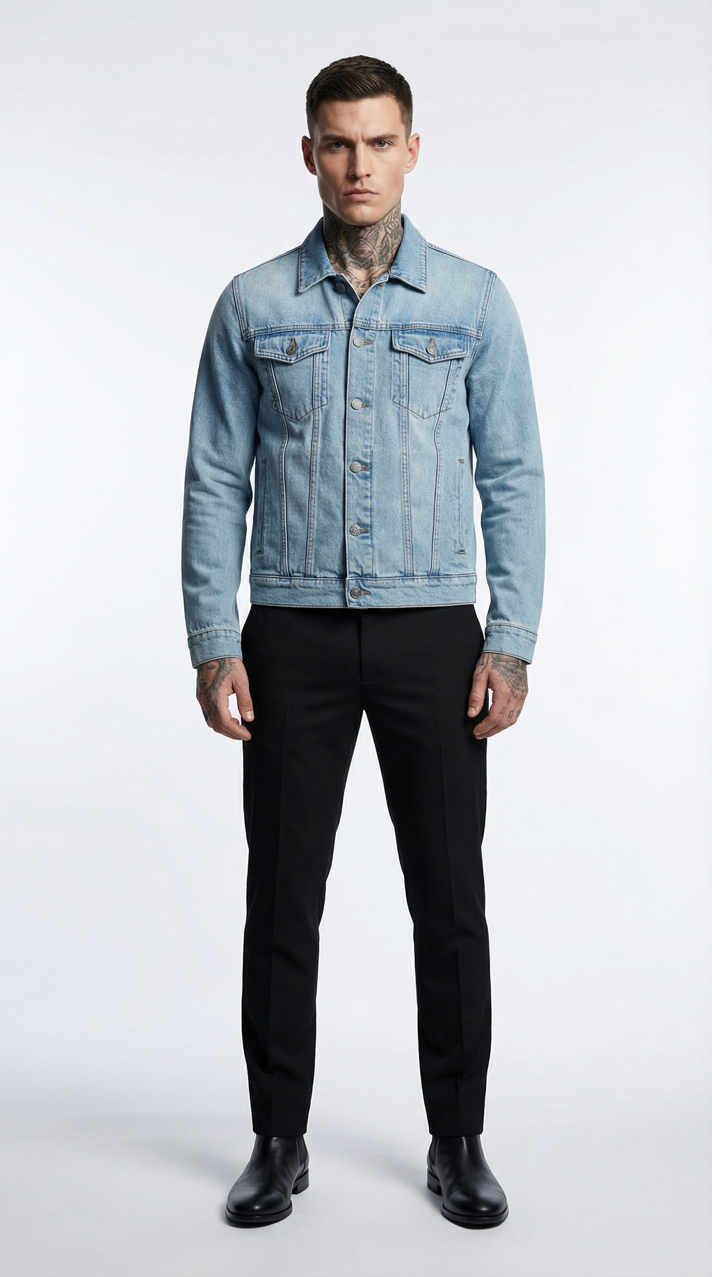 Man wearing a light blue denim jacket  from Meleche or Meléche (short as (Mé)) against a wooden background