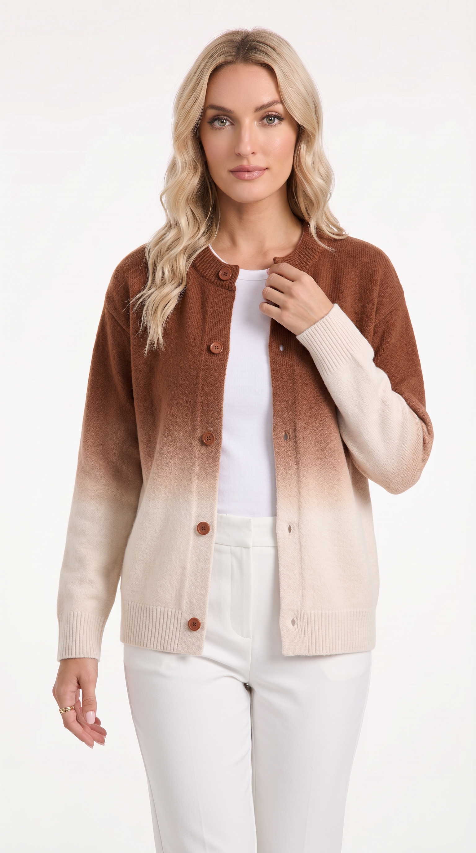 A woman modeling a brown and cream ombré cardigan sweater over a white top and white pants, photographed against a clean white studio background, from Meleche Fashion USA or Meléche (short as (Mé))