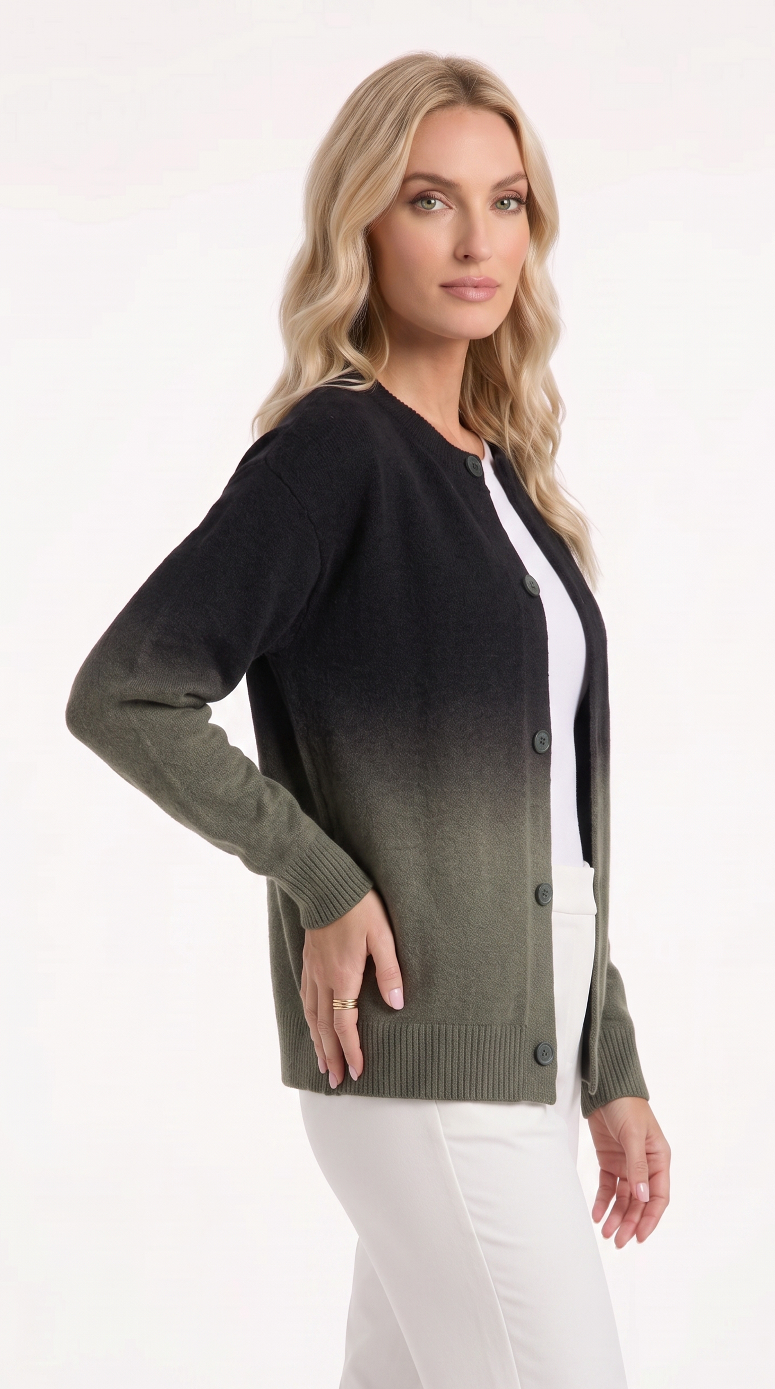 A woman modeling a long-sleeve button-front cardigan with a black-to-olive green ombre gradient, worn over a white top and white pants against a plain white studio background, from Meleche Fashion USA or Meléche (short as (Mé))