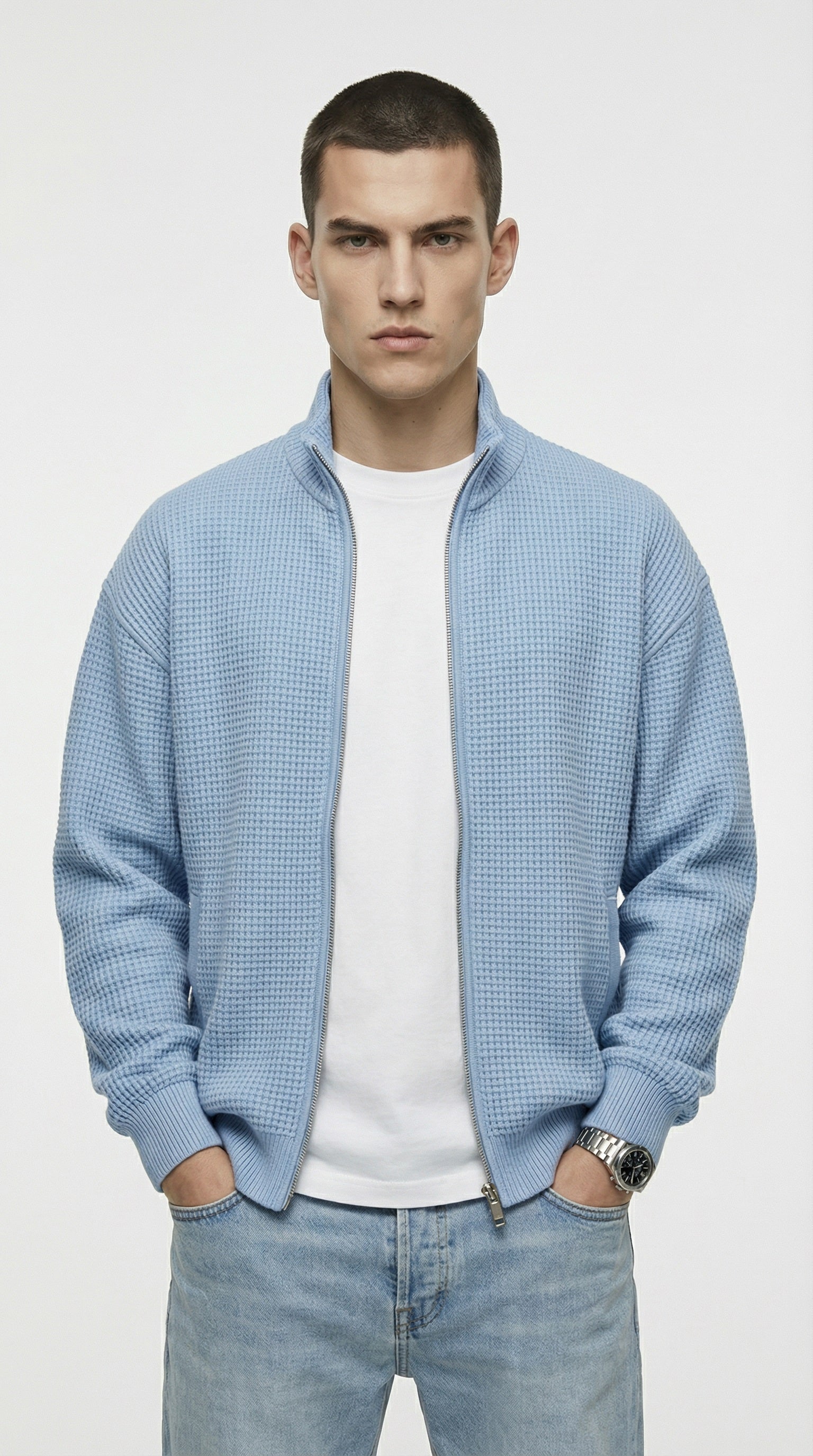 Man wearing a light blue textured jacket from Meleche or Meléche (short as (Mé))