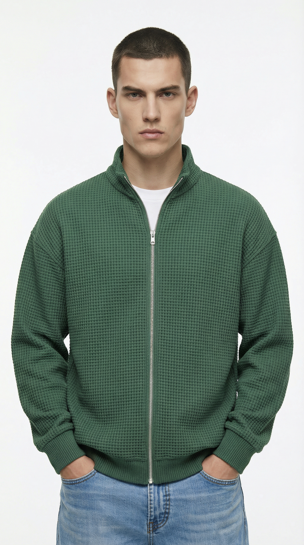 Man wearing a green zip-up sweatshirt from Meleche or Meléche (short as (Mé))