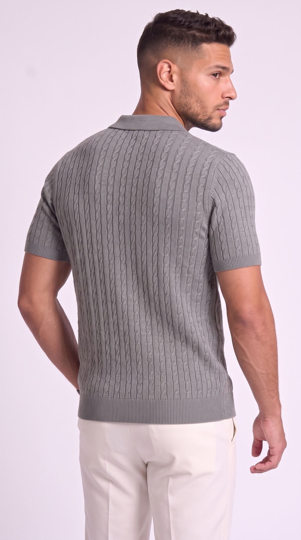 A man wearing a gray short-sleeve knit polo shirt with a cable pattern, shown from the back against a light studio background, from Meleche Fashion USA or Meléche (short as (Mé))