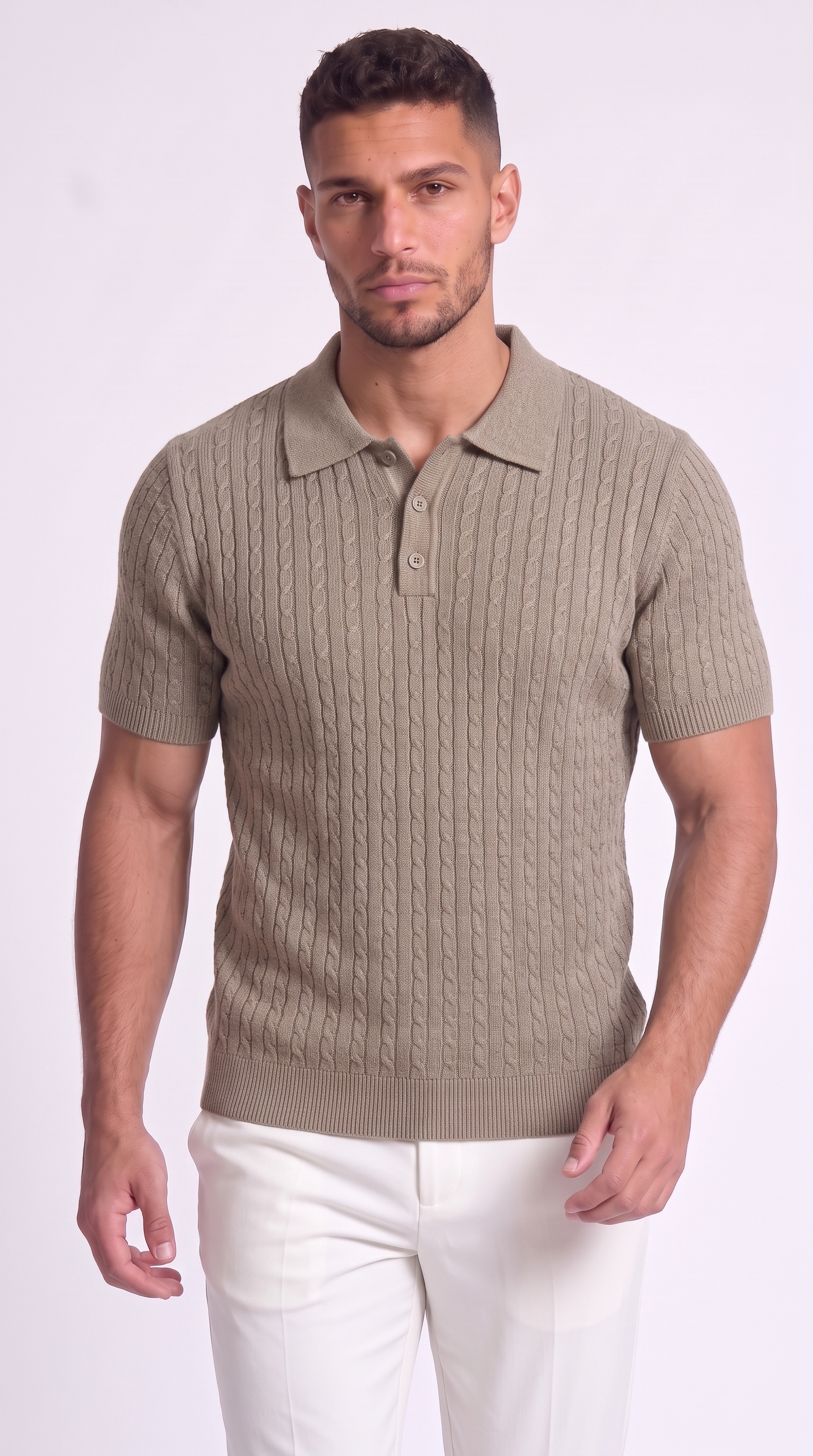 A man wearing a short-sleeve knit polo shirt in taupe-beige with a cable-knit pattern and white pants, standing against a light studio background, from Meleche Fashion USA or Meléche (short as (Mé))