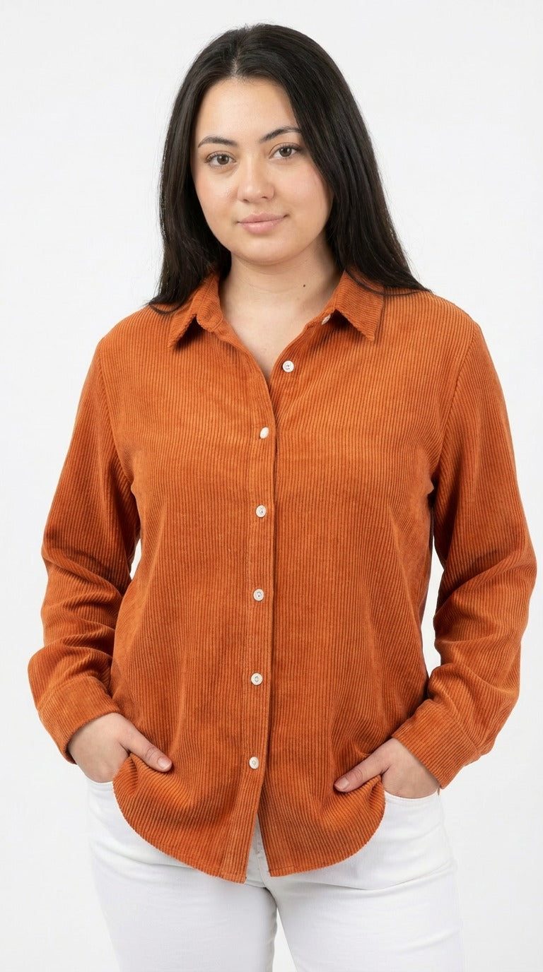 lou is wearing an orange corduroy shirt against a white background from Meleche or Meléche (short as (Mé))