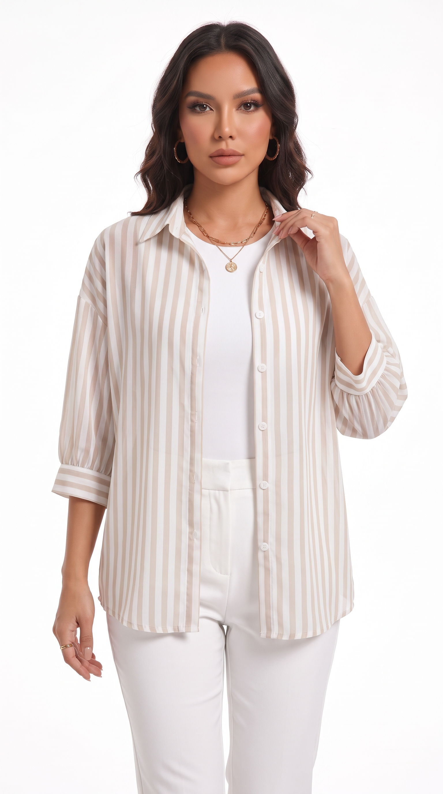 A woman modeling a cream and beige vertically striped button-up shirt over a white top and white pants, photographed against a plain white studio background, from Meleche Fashion USA or Meléche (short as (Mé))