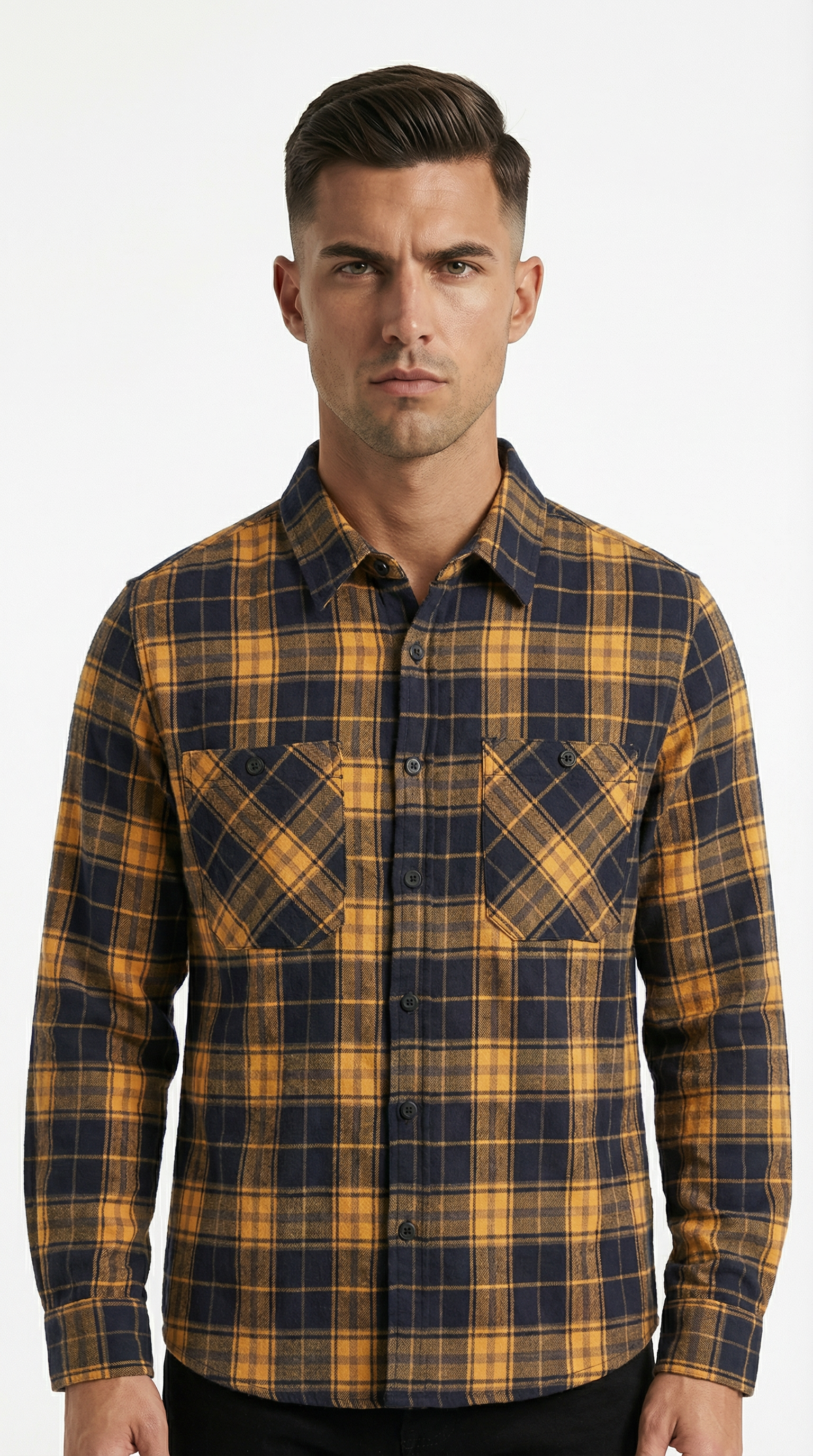 Man wearing a yellow and blue plaid shirt on a white background