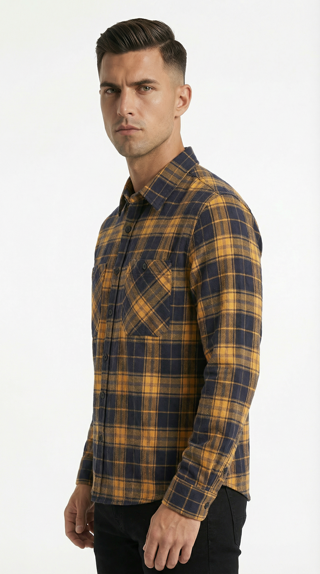 Man wearing a yellow and blue plaid shirt on a white background