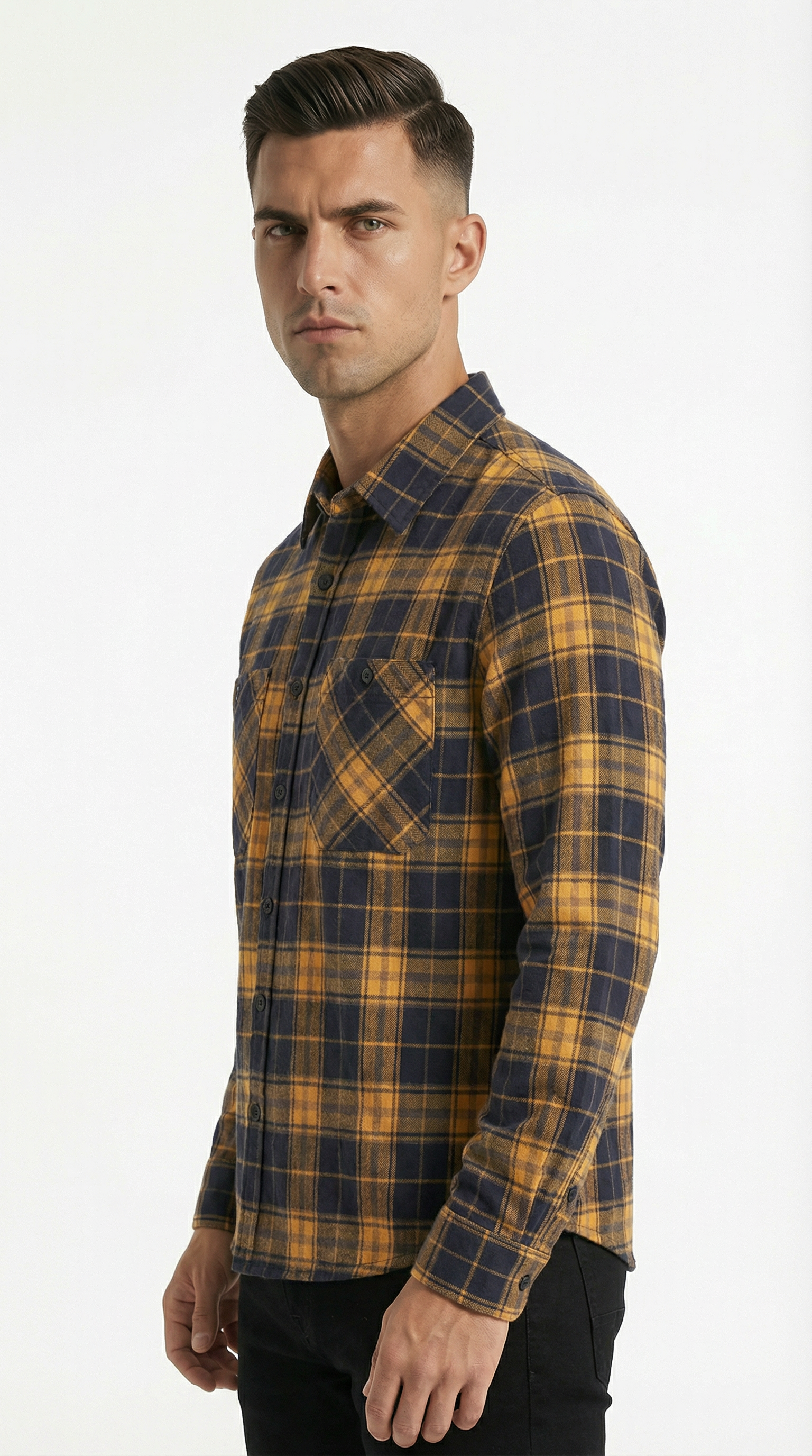 Man wearing a yellow and blue plaid shirt on a white background