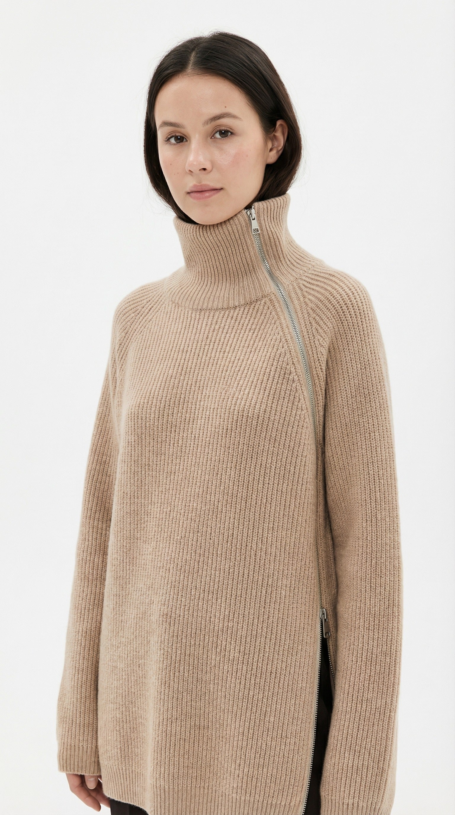 Beige knit sweater with a high neckline and front knot detail from Meleche or Meléche (short as (Mé))