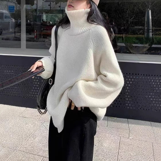 Person wearing a white turtleneck sweater and black pants outdoors from Meleche or Meléche (short as (Mé))