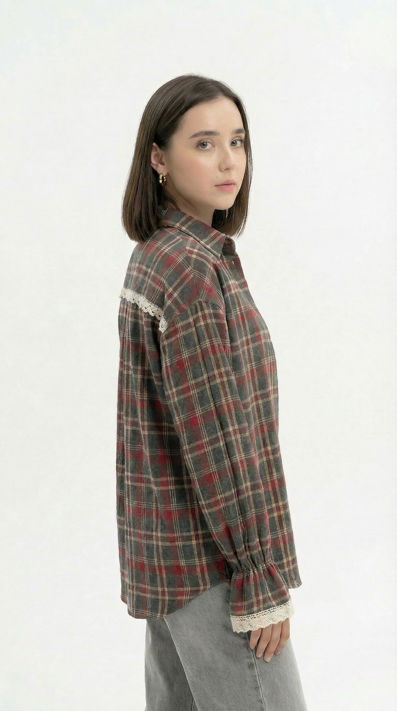 Person wearing a plaid shirt with lace trim on a white background from Meleche Fashion USA or Meléche (short as (Mé))