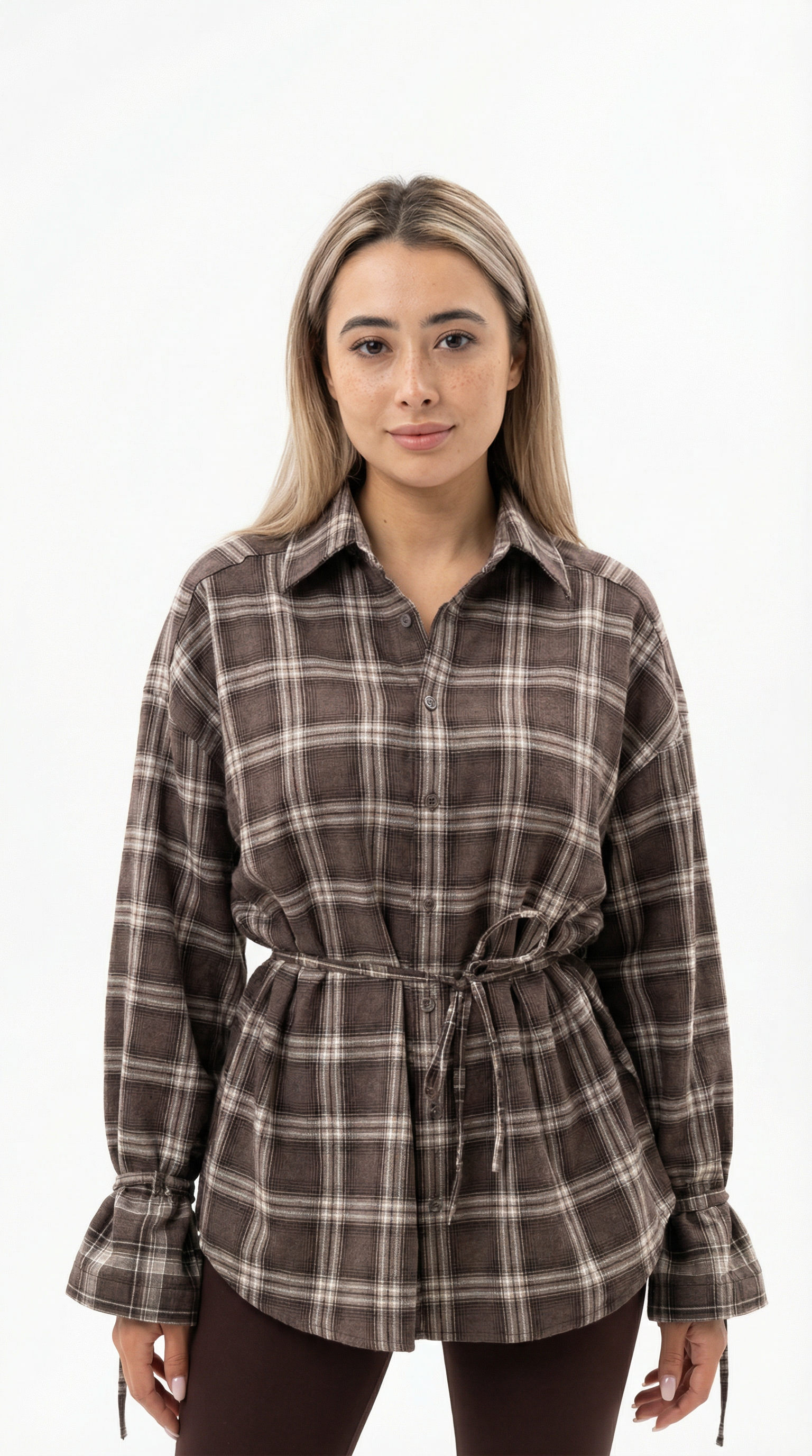 Person wearing a light gray hoodie with a black logo on a white background