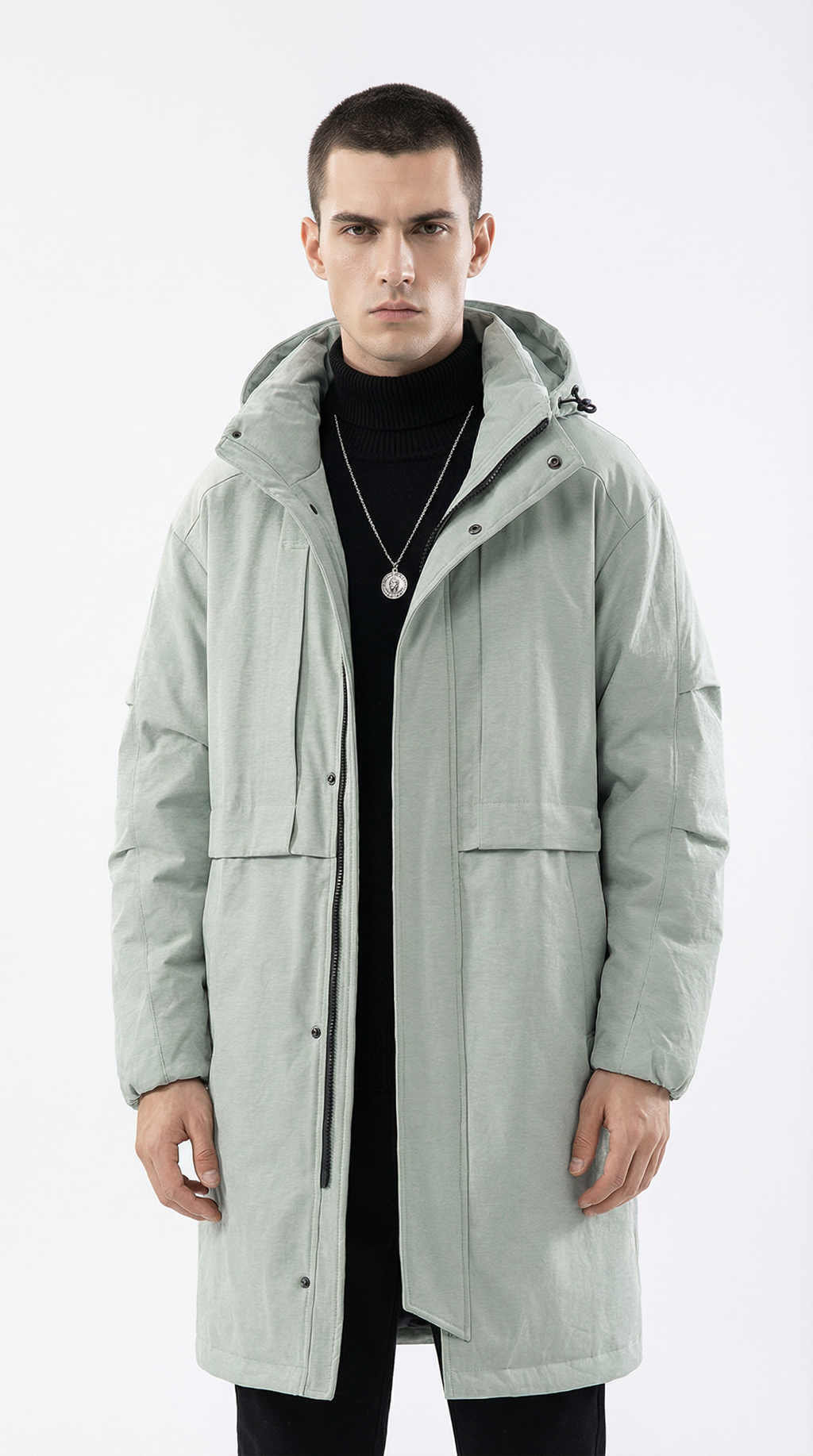 Man wearing a light gray coat on a white background