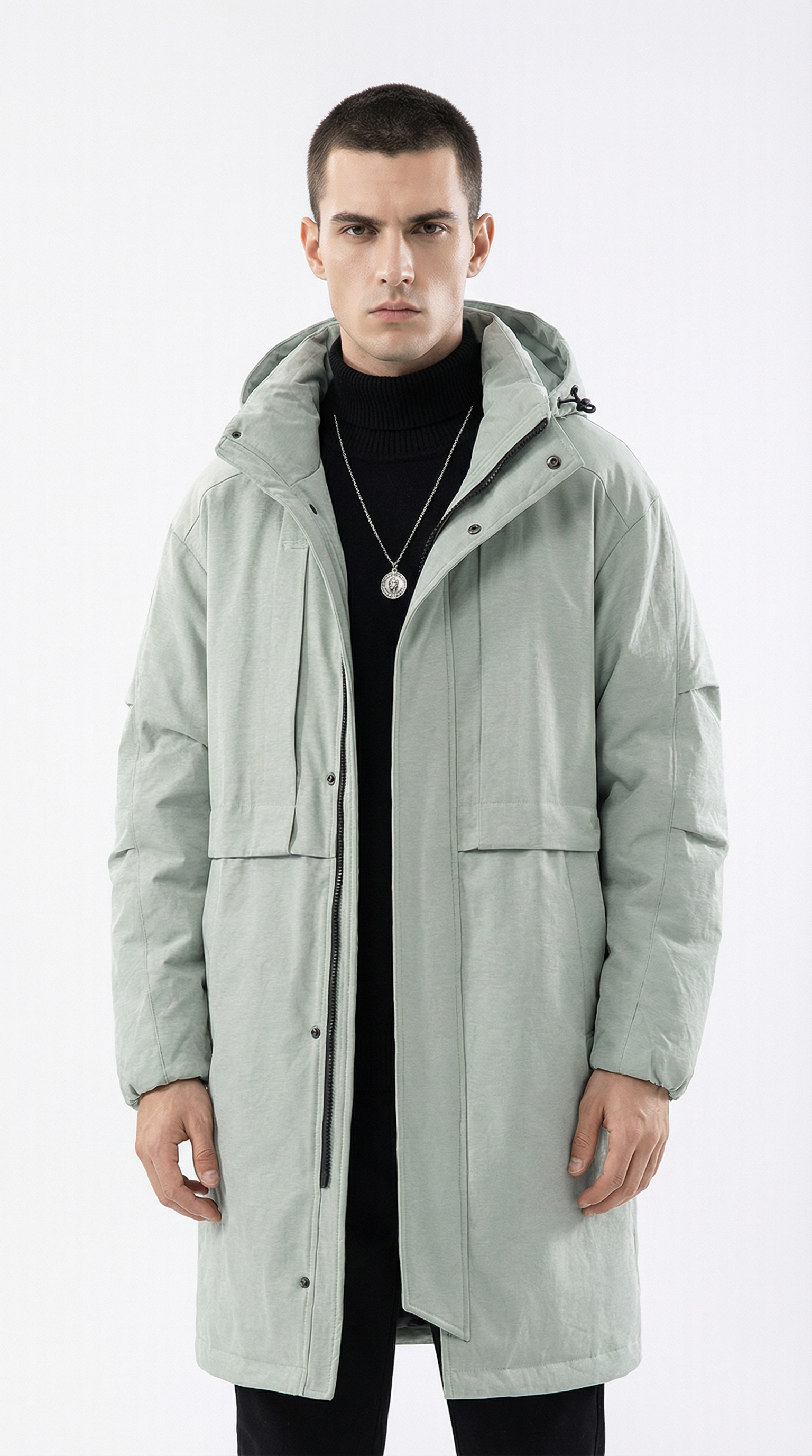 Man wearing a light gray coat on a white background