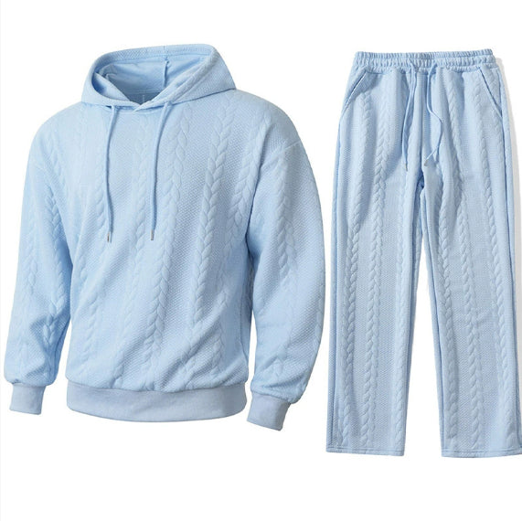 Light blue quilted hoodie and pants set on a white background