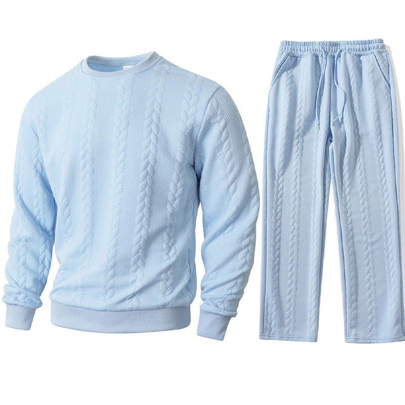 Light blue quilted sweatshirt and pants set on a white background