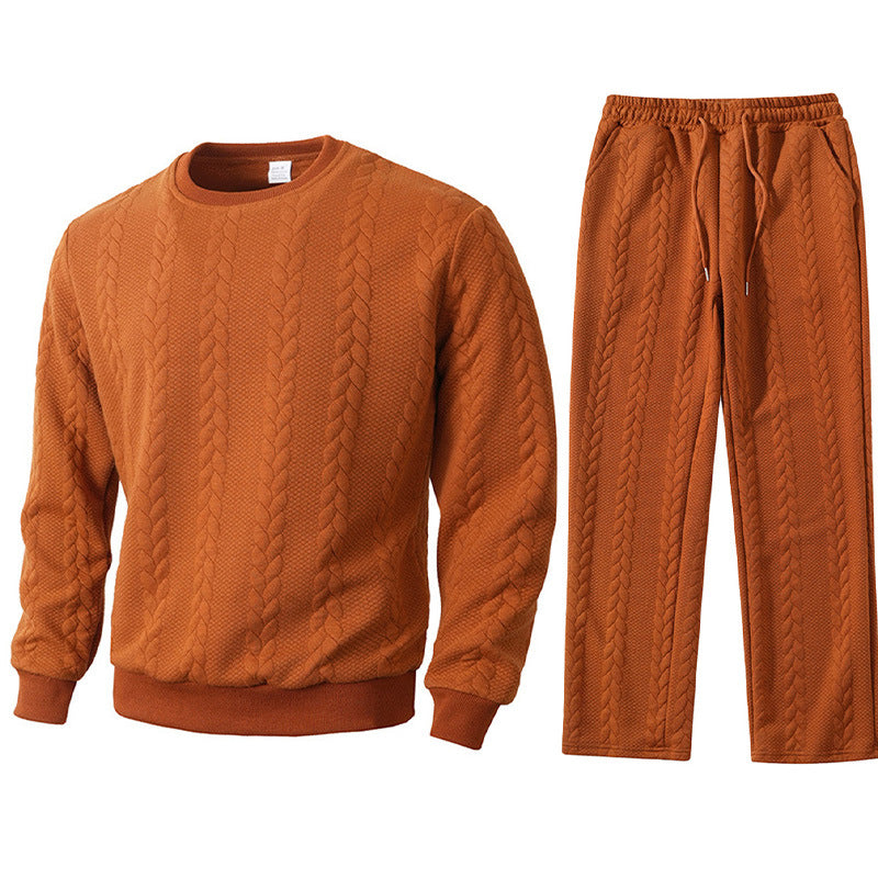 Brown cable knit sweater and pants set on a white background