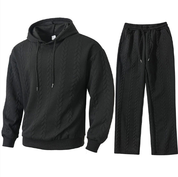 Black hoodie and pants set on a white background