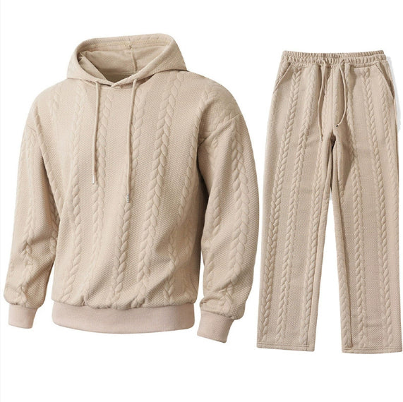 Beige cable-knit hoodie and pants set on a white background